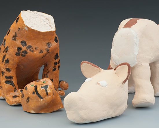 ceramic animals with blown-off heads