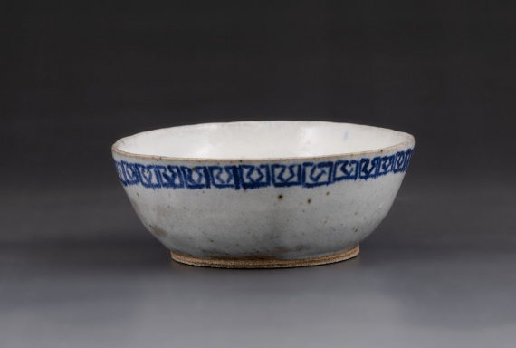 White bowl with blue overglaze rim pattern by Adriana Ghizila