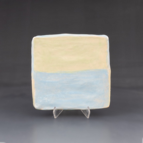 Pastel blue and yellow tray by Clara Lundberg