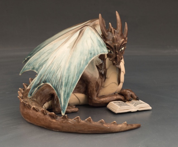 Dragon reading a book by Erin Gallagher