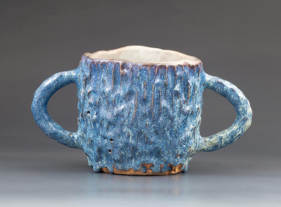 Large carved blue and white cup by Hannah Wiggins