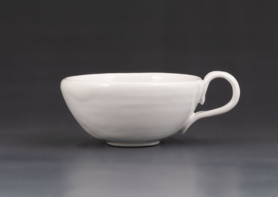 White teacup by Jaimie Murray