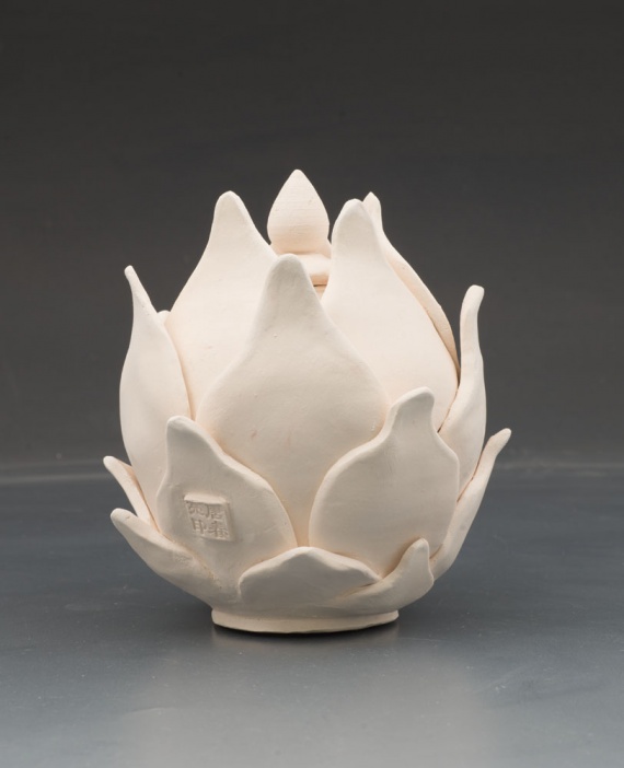 Unglazed pot with lid by Jenna Tong