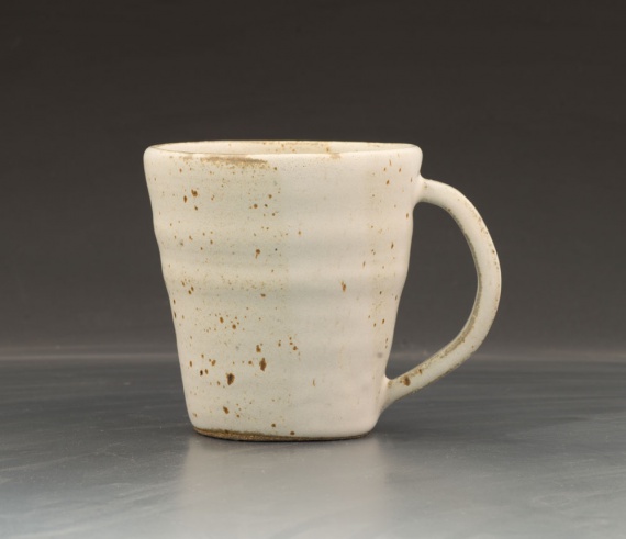 Cup with handle by Kam Taylor
