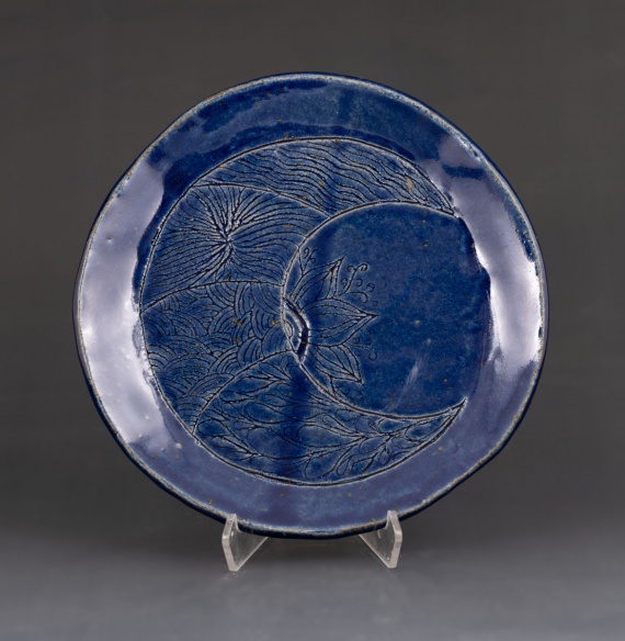 Blue plate with engraved design by Melissa Vasquez Sanchez