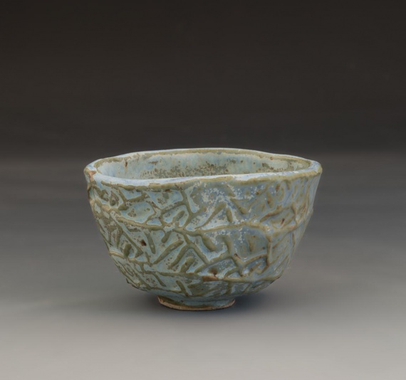 Blue textured cup by Peyton Carroll