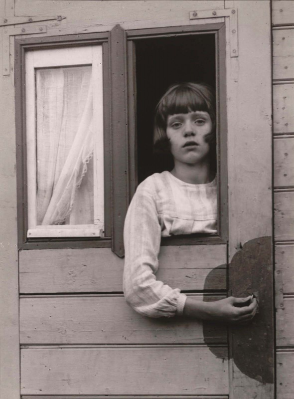 <p><b>August Sander</b>, <i>Young Girl in Circus Caravan, Düren</i>, 1926.</p>