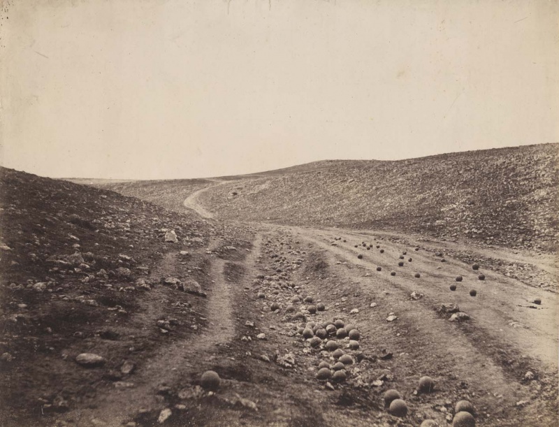 <p><b>Roger Fenton</b>, <i>The Valley of the Shadow of Death</i>, 1855. Version with cannonballs on road.</p>