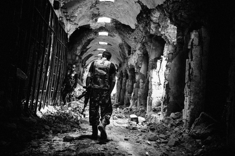 <p><b>Stanley Greene</b>, <i>The old souk, a UNESCO heritage site, April 2, 2013, from 'Syrian Dust'.</i></p>