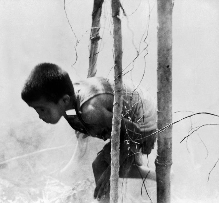 <p><b>W. Eugene Smith</b>, <i>Japanese boy emerging from hiding at the Battle of Saipan Island during the Pacific Campaign. World War II. June, 1944.</i></p>
