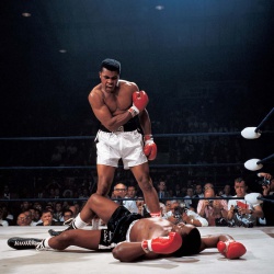 <p><b>Neil Leifer</b>, <i>Muhammad Ali reacts after his first round knockout of Sonny Liston during the 1965 World Heavyweight Title fight at St. Dominic’s Arena. Lewiston, Maine 5/25/1965.</i></p>
