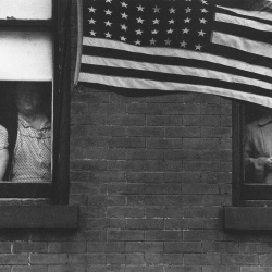 <p><b>Robert Frank</b>, <i>Parade, Hoboken, New Jersey</i>, 1955.</p>