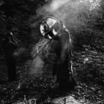 <p><b>Abbas Attar</b>, <i>RUSSIA. Moscow. Russian shaman VERA cleanses a patient of evil spirits, by drumming her "dungur", a flat drum. She operates in a small forest set in the capital</i>.</p>