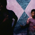 <p><b>Alex Webb</b>, <i>HAITI. Port-au-Prince. 1987. Cite Soleil.</i></p>