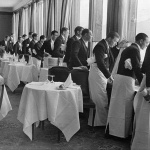 <p><b>Alfred Eisenstaedt</b>, <i>Waiters Watching Sonja Henie Skate</i>, 1932.</p>