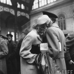 <p><b>Alfred Eisenstaedt</b>, <i>Penn Station, 1943. Couple sharing farewell embrace before he ships off to war.</p>