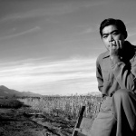 <p><b>Ansel Adams</b>, <i>Portrait of Tom Kobayashi at Manzanar</i>, 1943</p>