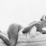 <p><b>Bert Stern</b>, <i>Marilyn Monroe: From The Last Sitting</i>, 1962. (Leaning back with wine).</p>