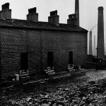 <p><b>Bill Brandt</b>, <i>Coal Miners' Houses with No Windows to the Street</i>, circa 1937.</p>