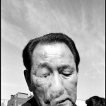 <p><b>Bruce Gilden</b>, <i>JAPAN. Tokyo. Asakusa. 1996. Man on the weekend smoking.</i></p>