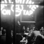 <p><b>Burt Glinn</b>, <i>USA. New York City. 1959. Hugh Nanton ROMNEY (later known as Wavy Gravy) at a poetry and song night at McSorley's Saloon.</i></p>