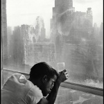 <p><b>Burt Glinn</b>, <i>USA. New York City. 1959. Sammy DAVIS Jr. looks out a Manhattan window.</i></p>