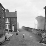 <p><b>Chris Killip</b>, <i>Housing and Shipyard, Wallsend, Tyneside</i>, 1975.</p>