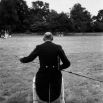 <p><b>Cornell Capa</b>, <i>GB. ENGLAND. Warwickshire. 1950. A contestant at an archery match in the Forest of Arden.</i></p>