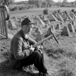 <p><b>David Seymour</b>, <i>GERMANY. Near Aachen. 1947. A young guard at the Siegfried Line, German-built fortifications on the Belgian-German border.</i></p>