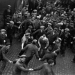 <p><b>David Seymour</b>, <i>Parisian suburb. June 1936. National strike for the 40 hour week, paid holidays, and collective agreements. During a sit in at their factory, workers entertain each other. </i></p>