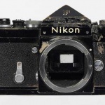 <p><b>Don McCullin/Imperial War Museum</b>, Don McCullin's Nikon F that stopped an AK-47 round intended for him at Prey Veng, Cambodia, 1970.</p>