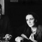 <p><b>Eve Arnold</b>, <i>GB. ENGLAND. Shepperton. Richard BURTON and Elizabeth TAYLOR at the local pub in Shepperton where he is starring in the role of Becket. Note Elizabeth's packet of sausages that will be cooked for her dinner by the chef in her four-star hotel</i>, 1963, © Eve Arnold/Magnum Photos</p>