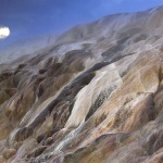 <p><b>Frans Lanting</b>, <i>Moonrise over mineral terraces, Yellowstone National Park, Wyoming</i>.</p>