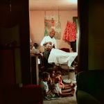 <p><b>Gordon Parks</b>, <i>In-home barbershop</i>, Shady Grove, Alabama, 1956.</p>