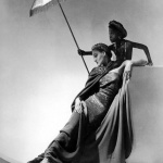 <p><b>Horst P. Horst</b>, <i>Model, Boy, Umbrella, Vogue</i>, 1935.</p>