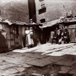 <p><b>Jacob Riis</b>, <i>Tramps Lodging in a Jersey Street Yard</i>, 1898.</p>