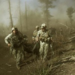 <p><b>Lynsey Addario</b>, 2008. U.S. troops carry the body of Staff Sgt. Larry Rougle, who was killed when the insurgents ambushed their squad in the Korengal Valley. Soldiers with the 173rd battle company, on a battalion mission in the korengal valley in the village of Yakachina. 2008</p>