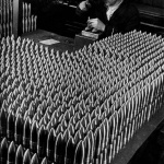 <p><b>Margaret Bourke-White</b>, <i>Czech worker stamping 15-centimeter shells in the Skoda munitions factory, Czechoslovakia</i>, 1938.</p>