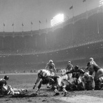 <p><b>Neil Leifer</b>, <i>Alan Ameche of the Baltimore Colts scores the game winning touchdown versus the New York Giants during sudden death overtime of the 1958 NFL Championship game at Yankee Stadium. The Bronx, New York 12/28/1958.</i></p>