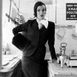 <p><b>Norman Parkinson</b>, <i>Wenda Parkinson</i>, Vogue 1952. Suit by Dorville, flannel hat by Simone Mirman, beaver muff by National Fur Co.</p>