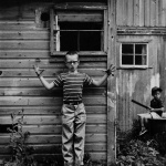 <p><b>Ralph Eugene Meatyard</b>, <i>Untitled (Boy Making Gesture)</i>, 1959.</p>
