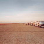 <p><b>Richard Misrach</b>, <i>Restraining Wall and Campers, Edwards Air Force Base, California</i>, 1983.</p>