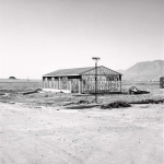 <p><b>Robert Adams</b>, <i>Frame for a Tract House, Colorado Springs, Colorado</i>, 1969.</p>