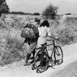 <p><b>Robert Capa</b>, <i>Near Nicosia, July 28th, 1943. An Italian soldier straggling behind a column of his captured comrades , marching towards a Prisoner Of War camp.</i></p>