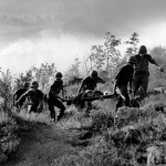 <p><b>Robert Capa</b>, <i>American troops going from the Chiunzi Pass to Naples. Late September 1943. On their way they encountered various small pockets of resistance.</i></p>