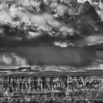 <p><b>Sebastião Salgado</b>, <i>The Grand Canyon viewed from National Forest, Arizona. The big mesa visible on the far side of the canyon is in Navajo territory. This photograph was taken during a localized snowstorm. Utah, USA, April-June 2010.</i></p>
