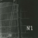 <p><b>Tina Modotti</b>, <i>Oil Tank</i>, 1927.</p>