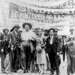 <p><b>Tina Modotti</b>, <i>Diego Rivera and Frida Kahlo, Mexico City</i>, 1 May 1929.</p>