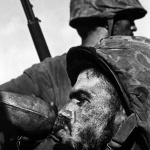 <p><b>W. Eugene Smith</b>, <i>U.S. Marine drinks out of his canteen at the Battle of Saipan Island during the Pacific Campaign. World War II. 27 June, 1944.</i></p>