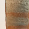 This cross-section was made by joining coils on the inside rim of the pot, then pinching them up to the desired thickness and form. The seams between coils are long diagonals, so the coils have more surface area to grip to each other with. The red clay was noticeably stiffer than the white, so it did not blend as well as it might have.